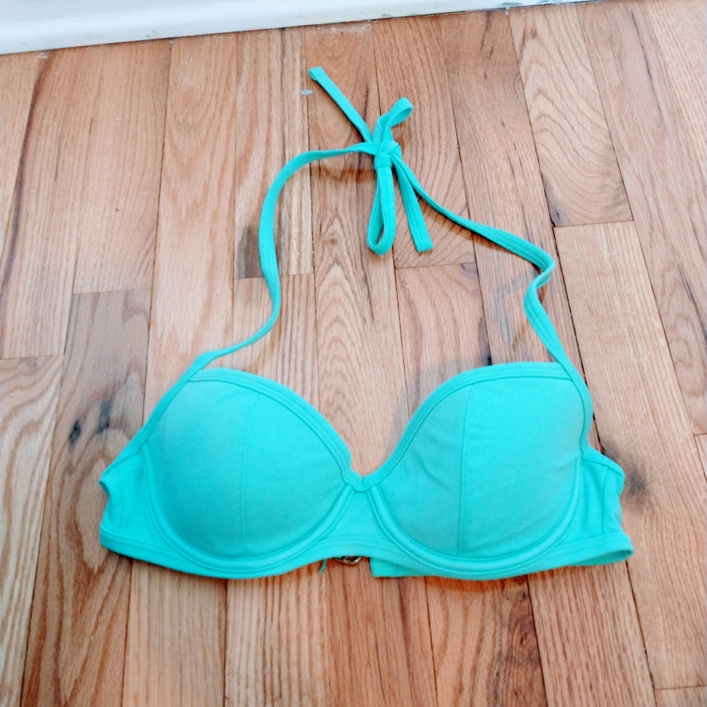 VS bikini halter top with molded cups. Size 34B. Some wear in the back clasp
